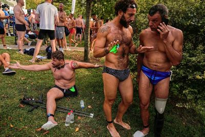 Ukrainian war veterans swim the Bosphorus strait in a triumph over their war injuries