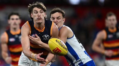 Crows lock star defender on long-term contract