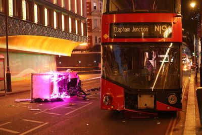 Three rushed to hospital after bus crashes with rickshaw in central London
