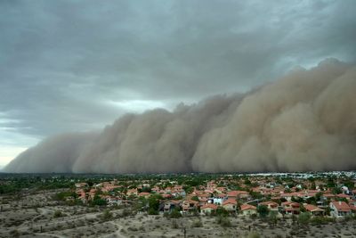 Giant wall of dust surges through Phoenix, leaving thousands without power