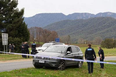 Police hunt ‘dangerous’ suspect who fled into Australian bush after allegedly killing two officers ‘in cold blood’