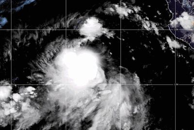 Tropical Storms Juliette and Fernand churn over open waters in 2 oceans
