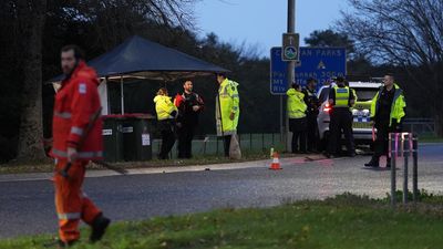 'Remain inside': manhunt continues for armed cop killer