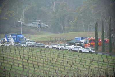 Porepunkah shooting: slain police officers named as manhunt for alleged killer continues