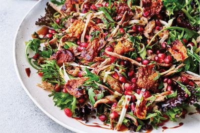 Turn duck legs into a showstopper salad with pomegranate, honey dressing and crispy skin