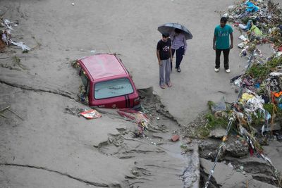Flash floods leave 32 dead in Indian-controlled Kashmir as over 150,000 are displaced in Punjab