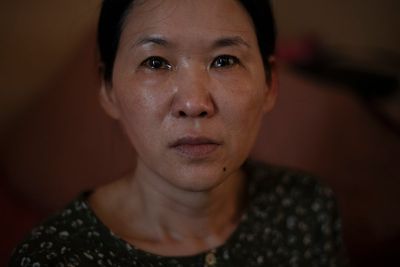 Woman seeks compensation from South Korea over her forced adoption to France in 1984