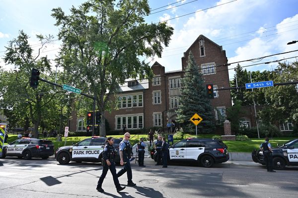 Two children killed after gunman fires into US Catholic school