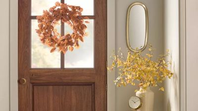 I've always steered clear of faux flowers – but since spotting Joanna Gaines' fall wreaths, I'm obsessed