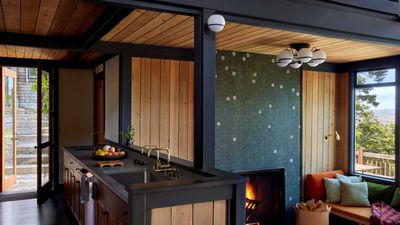 Feature walls might be a design faux pas, but feature fireplaces? Designers definitely approve of this statement trend that elevates a cozy room