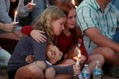 Minneapolis Catholic schoolchildren listened to a prayer, then ducked for cover from gunfire