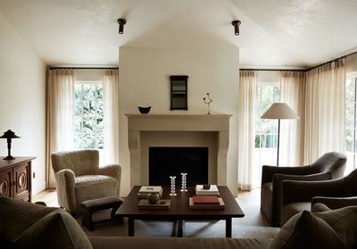 How Interior Designers (Secretly) Use Curtains to Make a Room Look Bigger