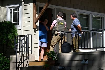 Neighbor watched cops take Minneapolis shooter’s family from their home as ‘surreal’ connection to killer set in