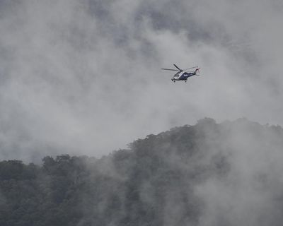 Severe thunderstorm warning for Porepunkah as manhunt continues – as it happened