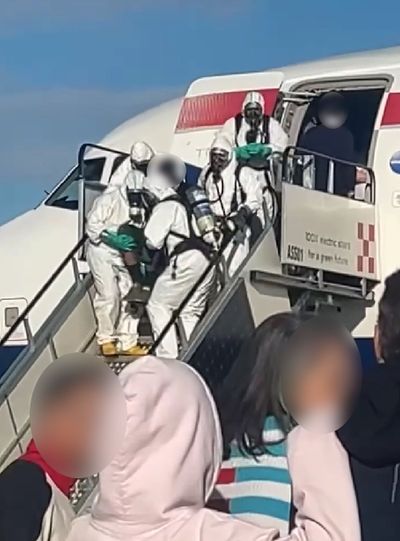 Watch: Dramatic moment hazmat crews board British Airways flight from London after mid-air scare