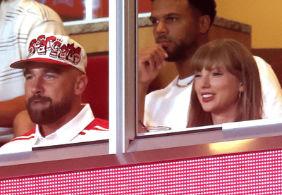 Taylor Swift and Travis Kelce ignore his ex's cryptic post as they enjoy first public outing as engaged couple