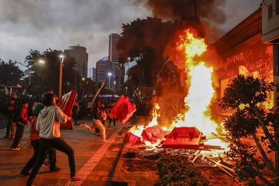 Three killed in fire at Indonesian government building blamed on protesters