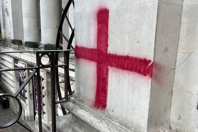 Vandals graffiti St George’s Cross on historic building