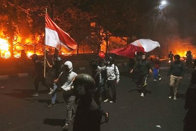 Protests in Indonesia turn violent as parliament building set alight