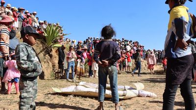 Malagasy families 'turn the dead' with silk and song to honour ancestors