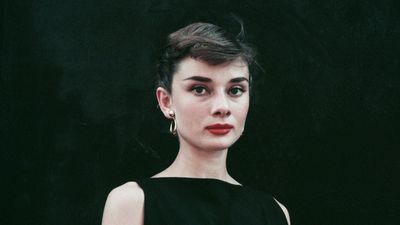 Audrey Hepburn's '70s bedroom was the pinnacle of coastal elegance 50 years before it was a trend – it proves the timelessness of wicker furniture, soft blues, and warm whites