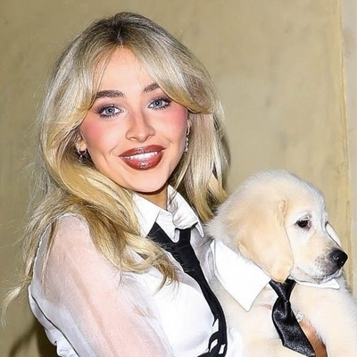 Sabrina Carpenter's 'Man's Best Friend' Era Style Includes Dog-Motif Tights and Sky-High Heels