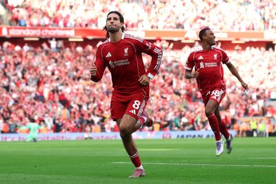 Liverpool v Arsenal live: David Raya points to new Premier League ball as Gary Neville questions Gunners’ mentality