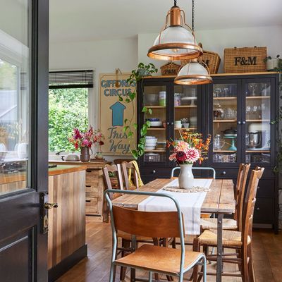 Swapping a Cotswold cottage for a cabin-style home in a village colony was the perfect move for this couple