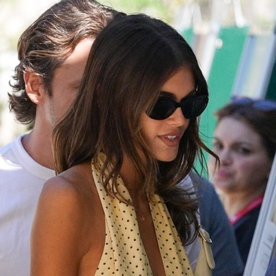 Kaia Gerber Co-Signs 2025's Polka-Dot Trend With Her Backless Halter Top and a Classic Gucci Bag