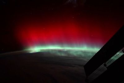 Rare red aurora glows above Earth in extraordinary space video
