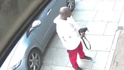 Man slashed in face by knifeman in 'unprovoked' broad daylight attack on high street