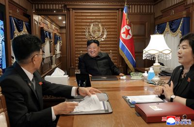 North Korea’s Kim Jong Un crossed into China via train, state media say