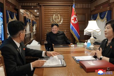 Kim Jong Un arrives in China on armoured train to meet Xi and Putin