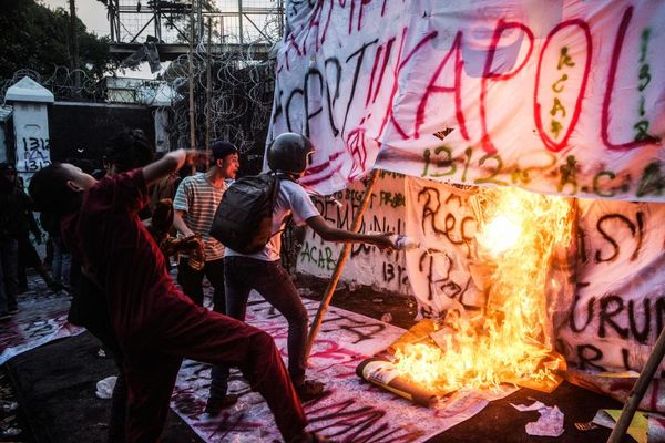 Twenty missing in Indonesia protests, rights group says