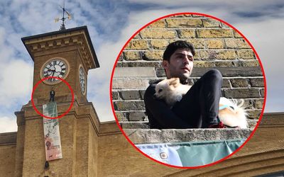'Freedom for Iran' protester who scaled King's Cross station clock tower holding a dog arrested after nearly four-hour stand-off