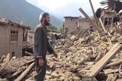 Afghanistan villagers dig through rubble with bare hands in desperate search for earthquake victims