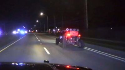 Watch a Cop Do an Insane and Dangerous PIT Manuever On a Heavily Modified Side-By-Side