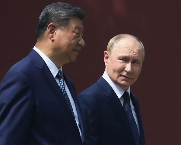 Putin hails ties with China as Kim Jong-un arrives in Beijing on eve of parade