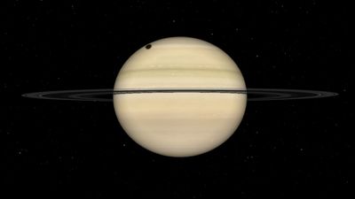 Colossal moon Titan casts a shadow on Saturn's cloud tops early on Sept. 4. Will you be able to see it?