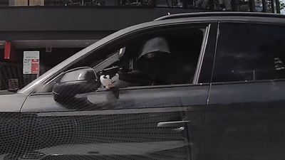 Startling CCTV captures hooded gunman in drive-by