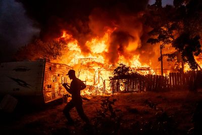 Homes destroyed as quick-moving wildfire burns through historic California Gold Rush town