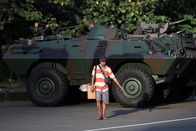 Women’s groups gather in front of parliament in Indonesia amid protests