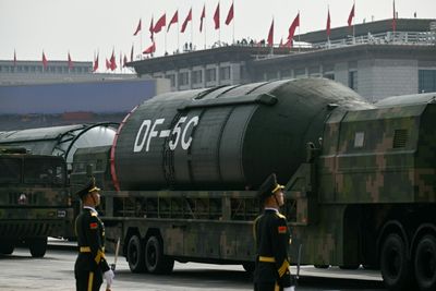 Beijing Shows Off Drones, Missiles And Lasers In Military Parade