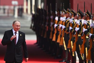 Sweeping air strikes hit Ukraine as Putin shakes hands at China parade