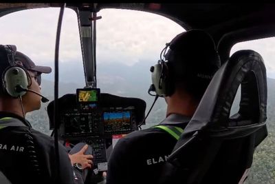 Indonesian rescuers find helicopter crash site on Borneo and recover 1 body so far