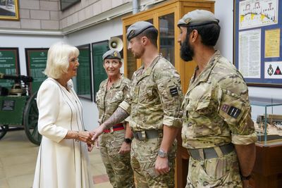 Queen presented with brooch to mark dedication to Army battalion