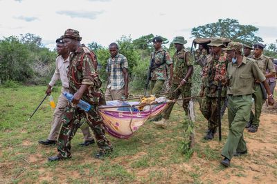 Exhumation in Kenya cult site paused to allow DNA sampling on 34 bodies
