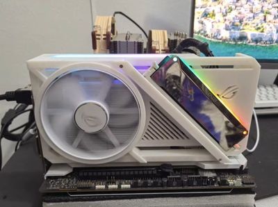 Making a 3D-printed custom GPU fan shroud with a DDR5 slot doesn't let you add extra VRAM, but at least it looks cool