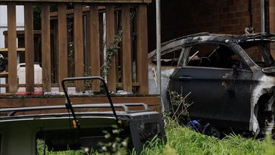 Lucky escape for two men caught brawling as house burns