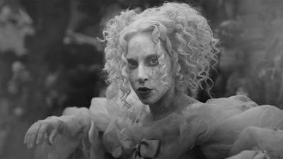 Lady Gaga follows up her Wednesday season 2 debut as Rosaline Rotwood by joining Tag Team and MC Hammer in the long legacy of Addams Family songs with a creepy new music video directed by Tim Burton